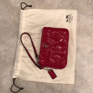 Red quilted Coach wristlet